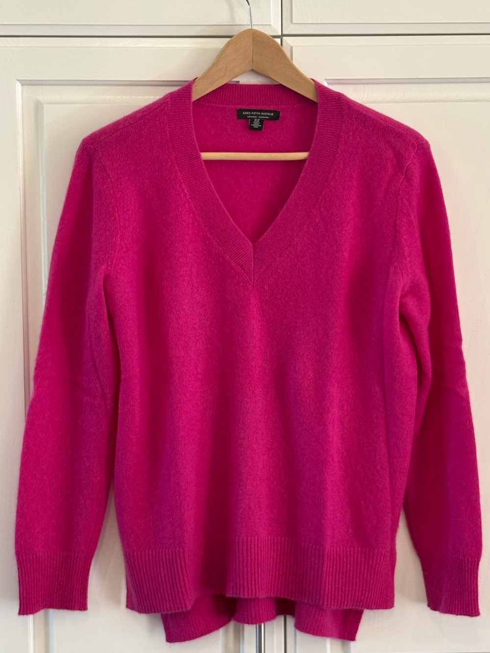 Saks Fifth Avenue 100% cashmere V-neck sweater in vibrant pink.